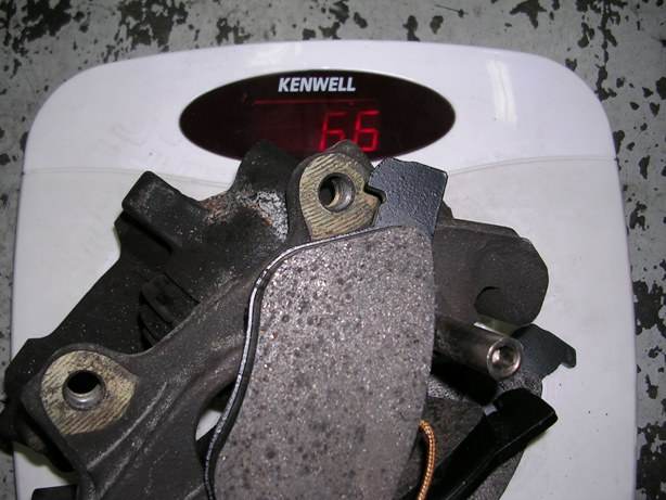 156%20stock%20caliper%20w%20pads.jpg