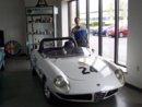 4A%20Larry%20and%20Kwech%20trphies%20behing%20car.jpg